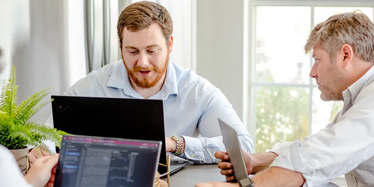 Jonathan Guider and Matt Braman engaged in a Versoft Consulting meeting